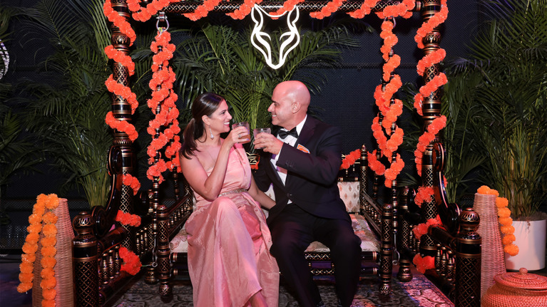 Two guests toast at the Wolf Trap Ball.